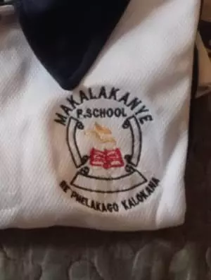White school shirt with embroidered school badge